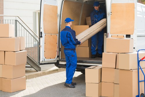 Removal van and moving boxes for a house move in Harringay