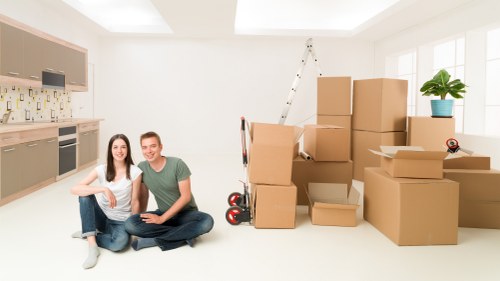 Office furniture and equipment being organised for relocation