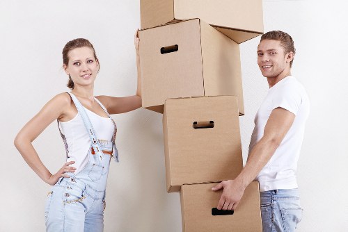 Professional movers handling furniture for a residential or commercial move