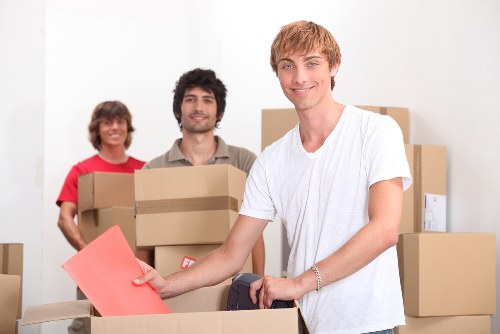Professional movers planning access and parking for a local move