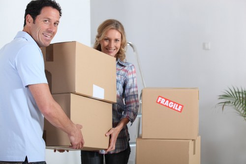 Loading household items into a removal van in North London
